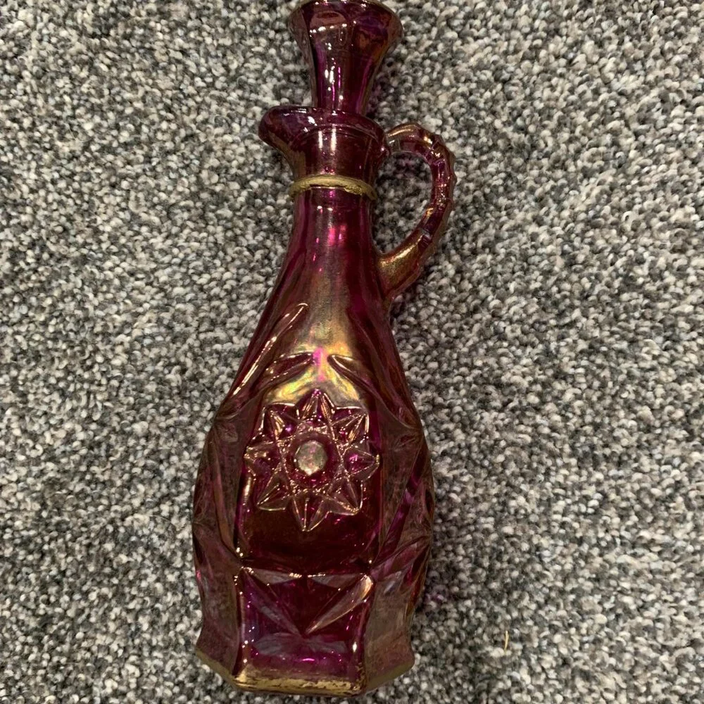 Glass pink and gold cruet